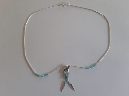 Wolf necklace with feathers 1